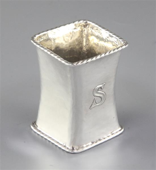 A George V Arts & Crafts planished silver waisted napkin ring, by Omar Ramsden, Height 60mm weight 1.3oz/42grms